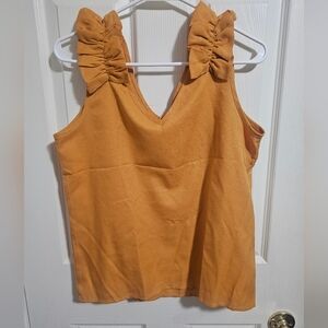Yellow sleeveless blouse
